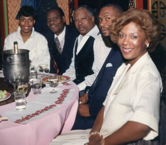 Guests seated together at a celebratory university dinner