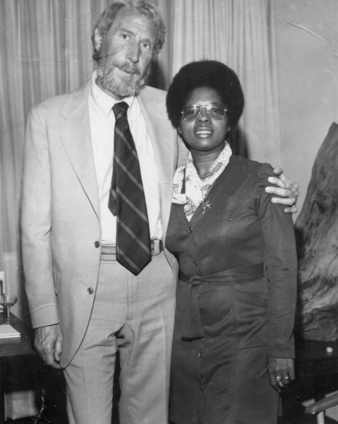 Two university leaders standing together for a portrait