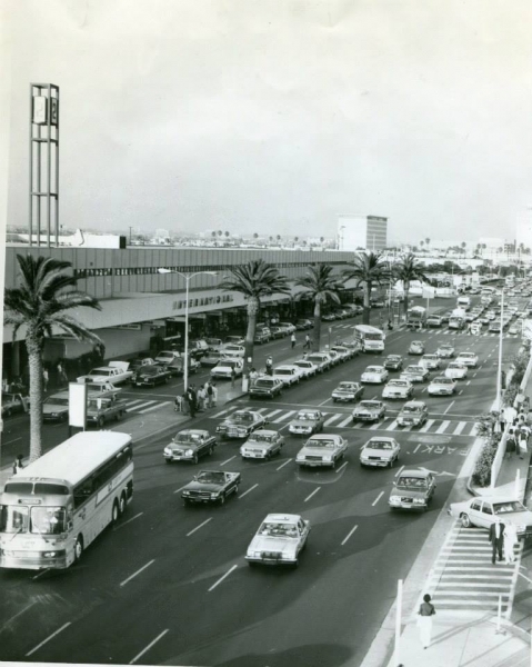 Historic black and white view of the Los Angeles International Airport terminal roadway