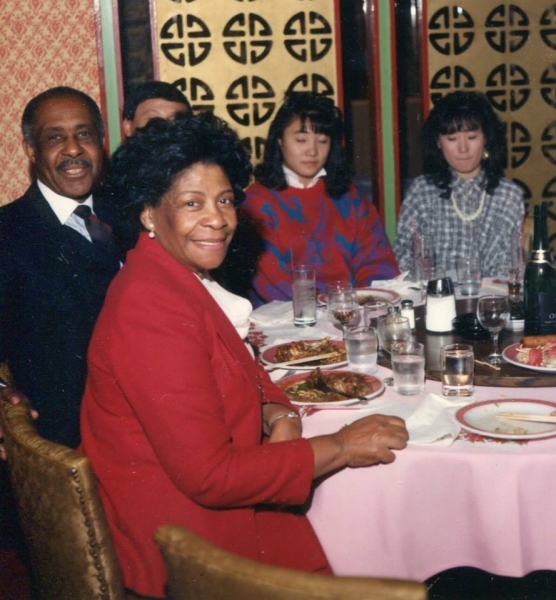 Guests seated around a banquet table at a commencement dinner